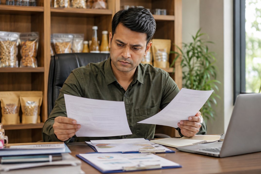 Food business owner reviewing FSSAI registration requirements